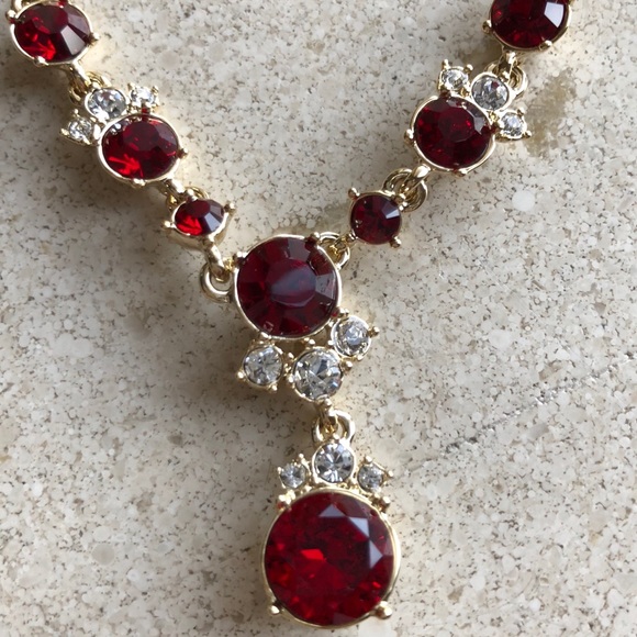 Givenchy Jewelry - Givenchy red y crystal accented necklace
